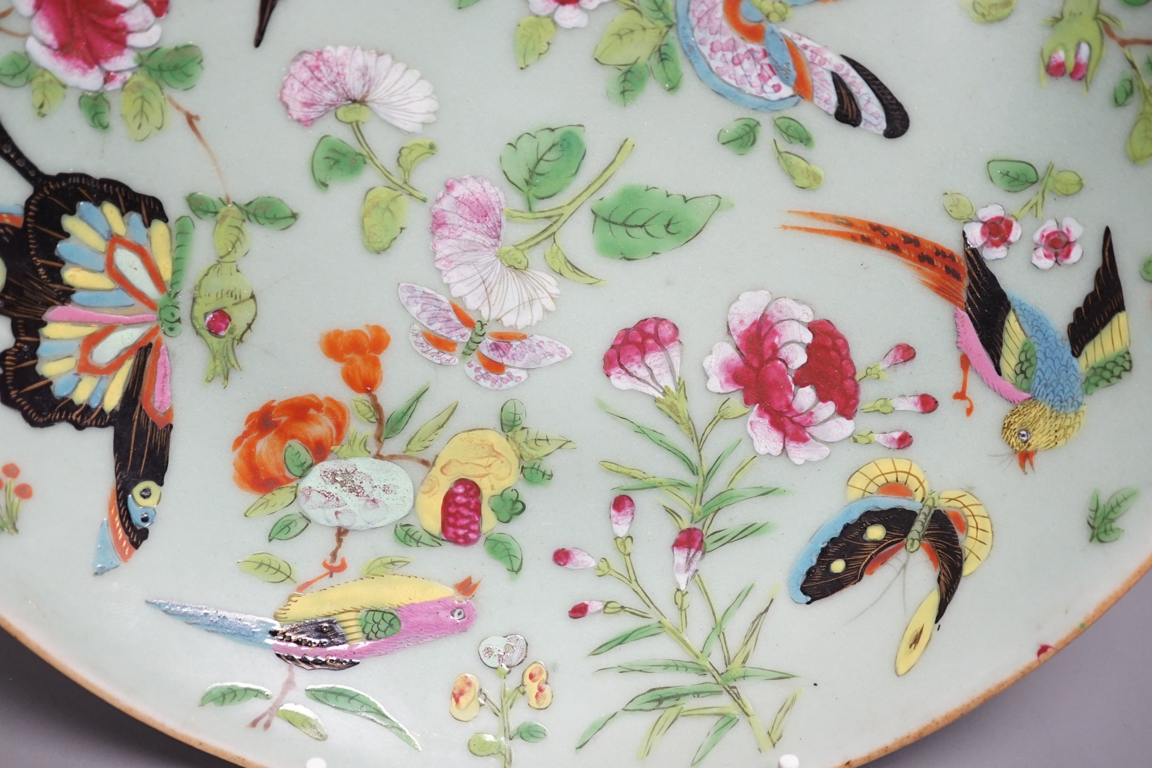 A Chinese celadon ground famille rose plate, Daoguang mark and of the period. 26cm diameter